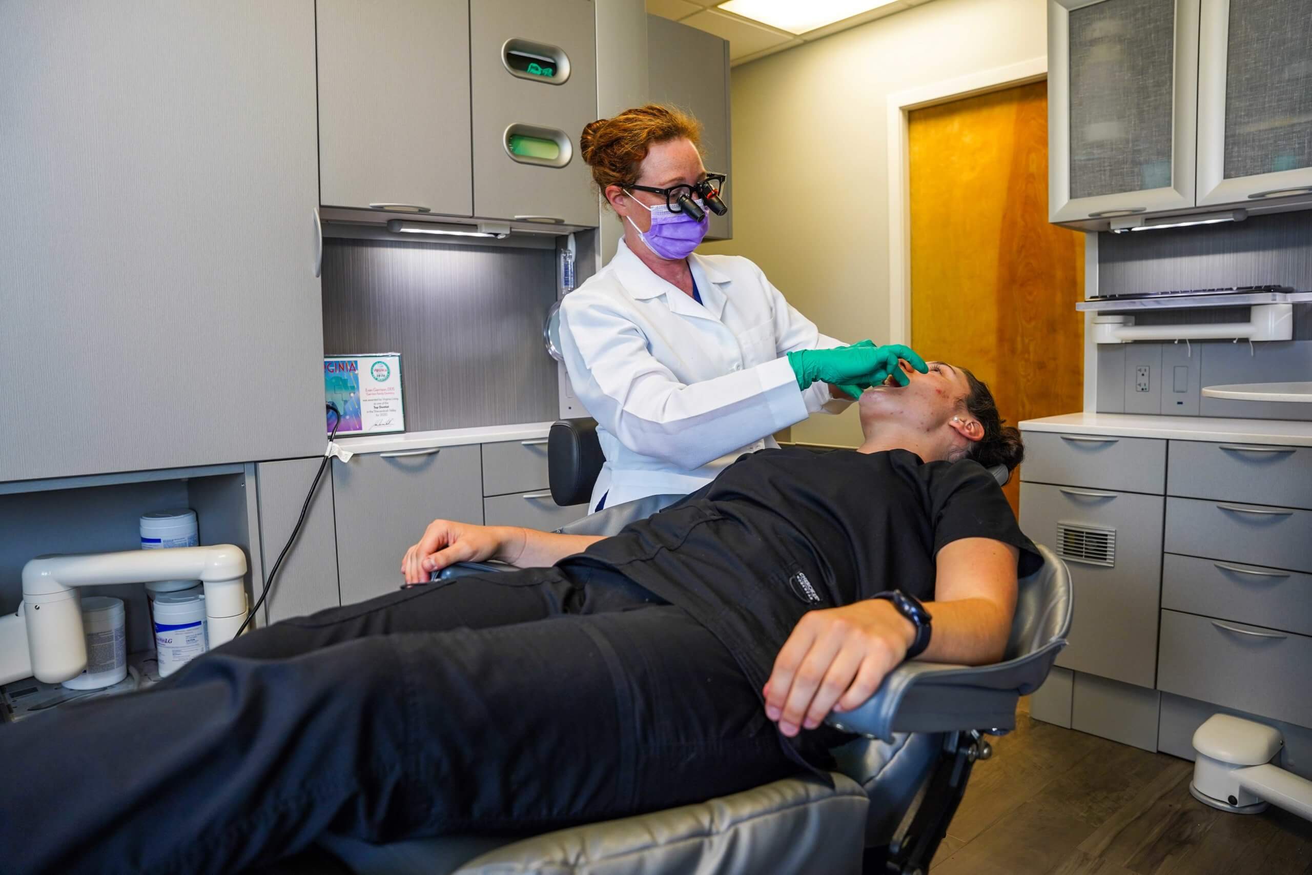 Dentist working on patient