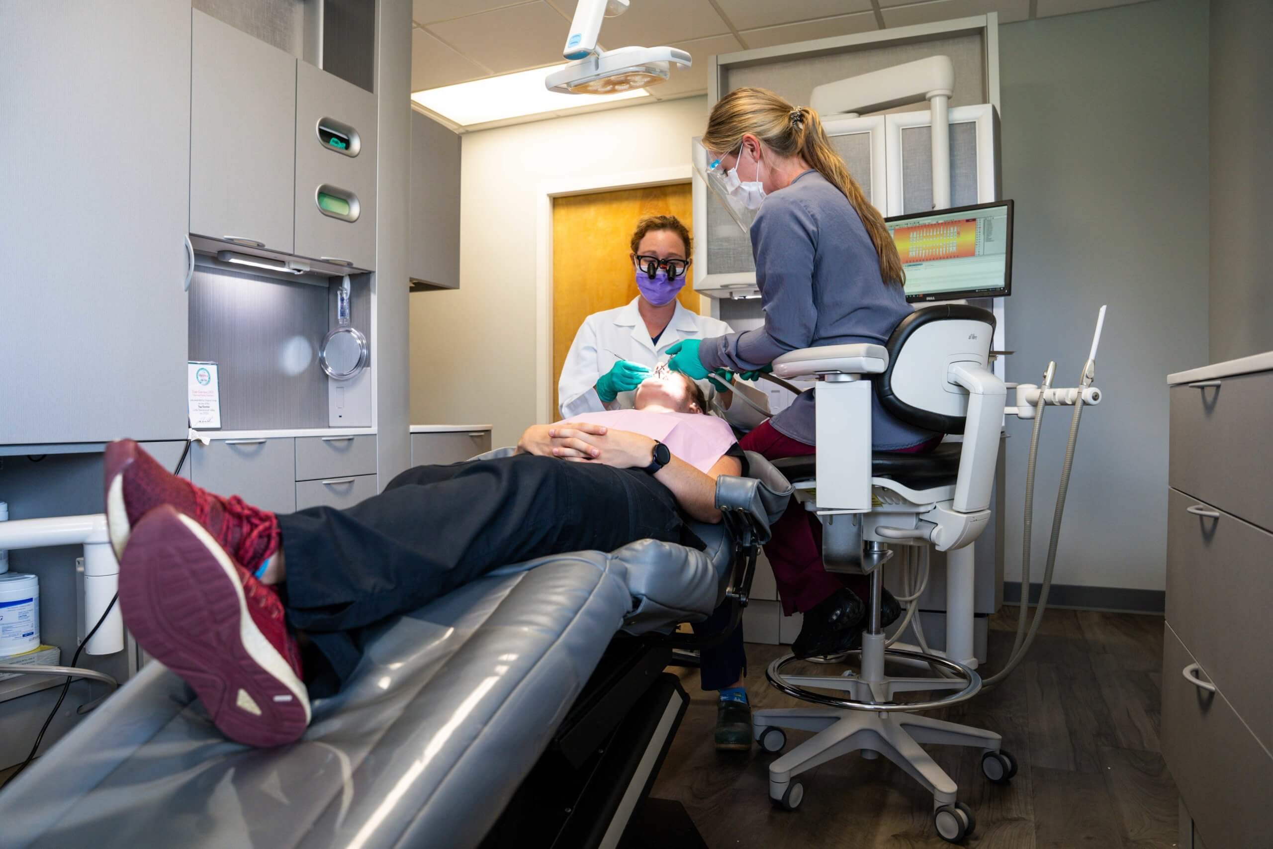 Dentists working on patient