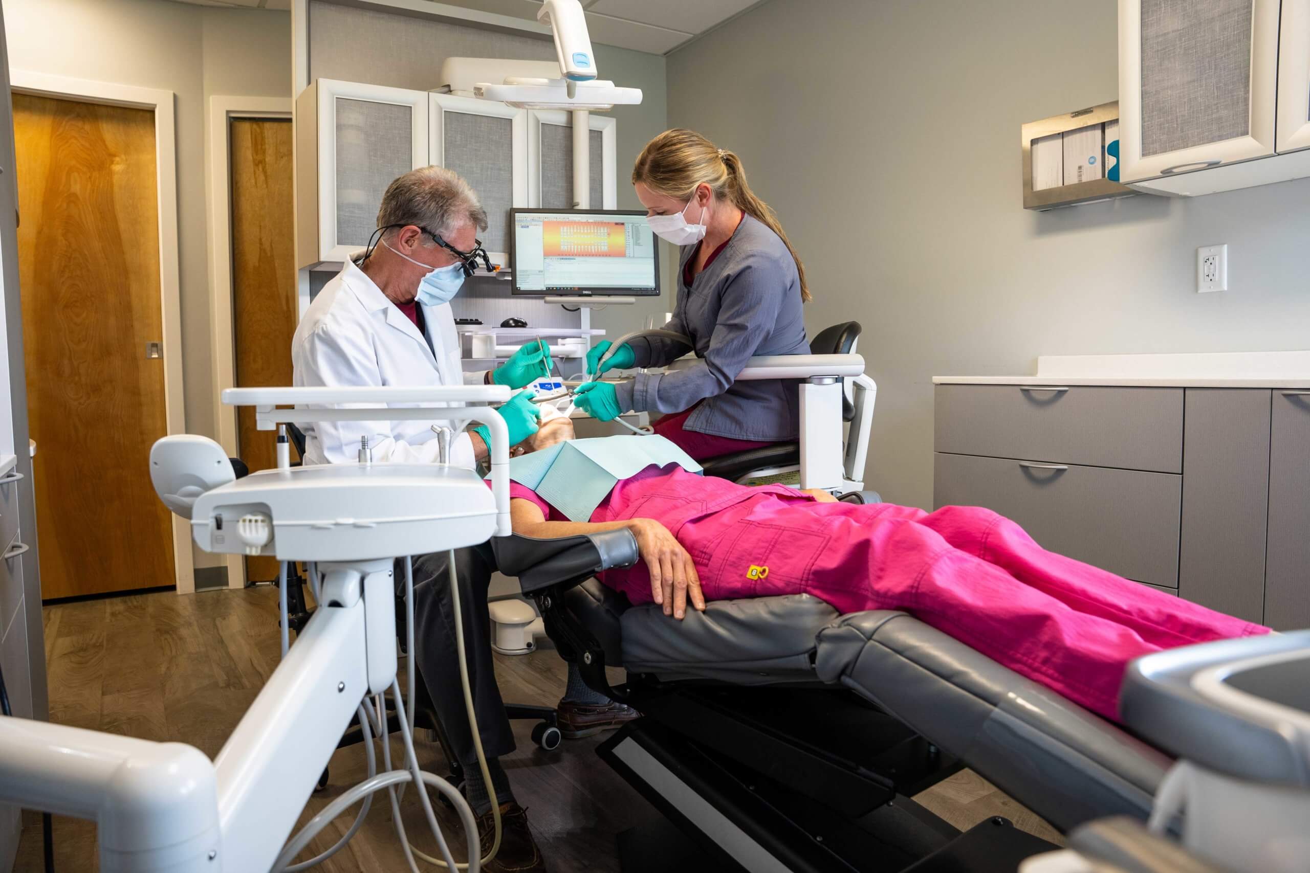 Dentists working on patient