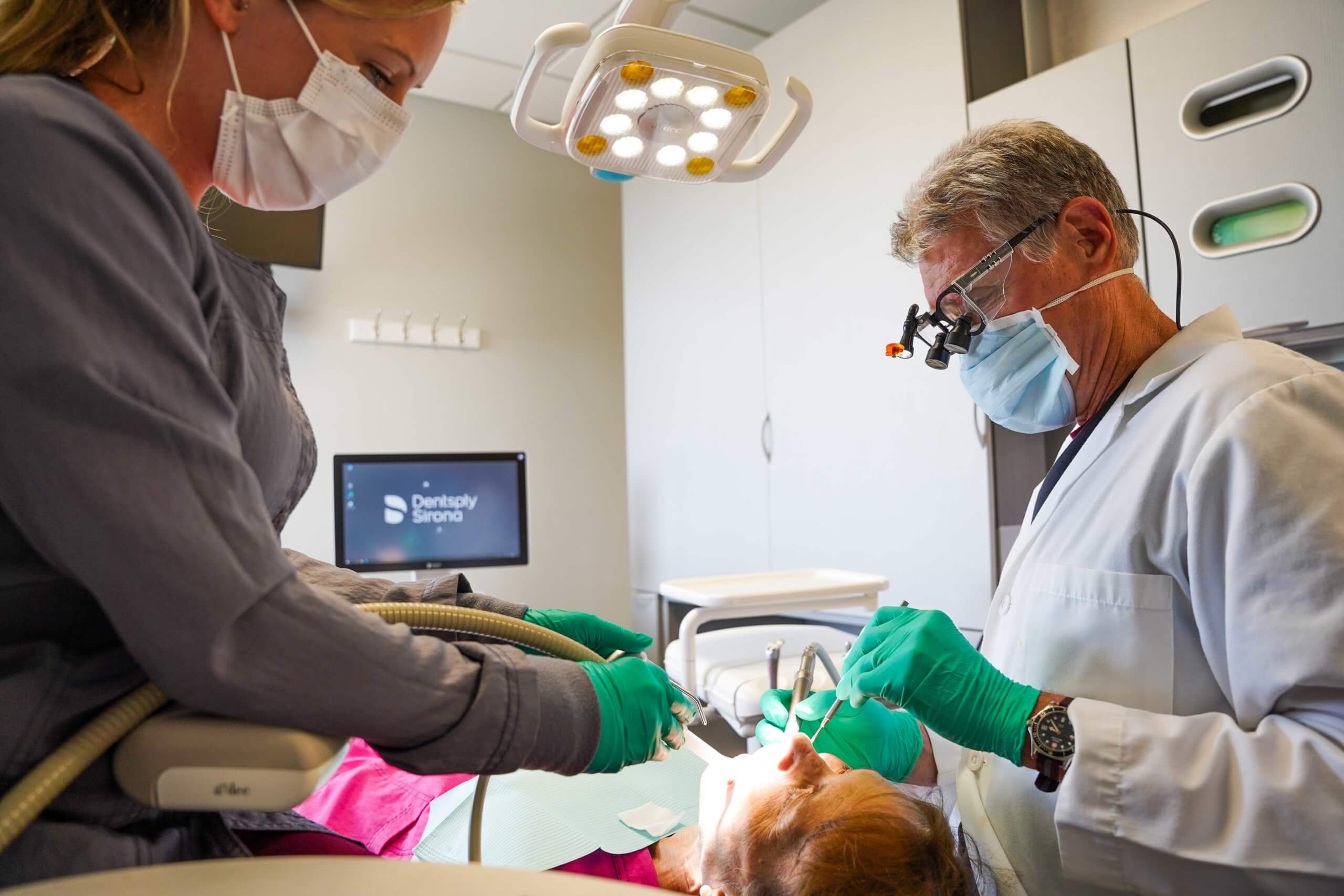 Dentist working on patient