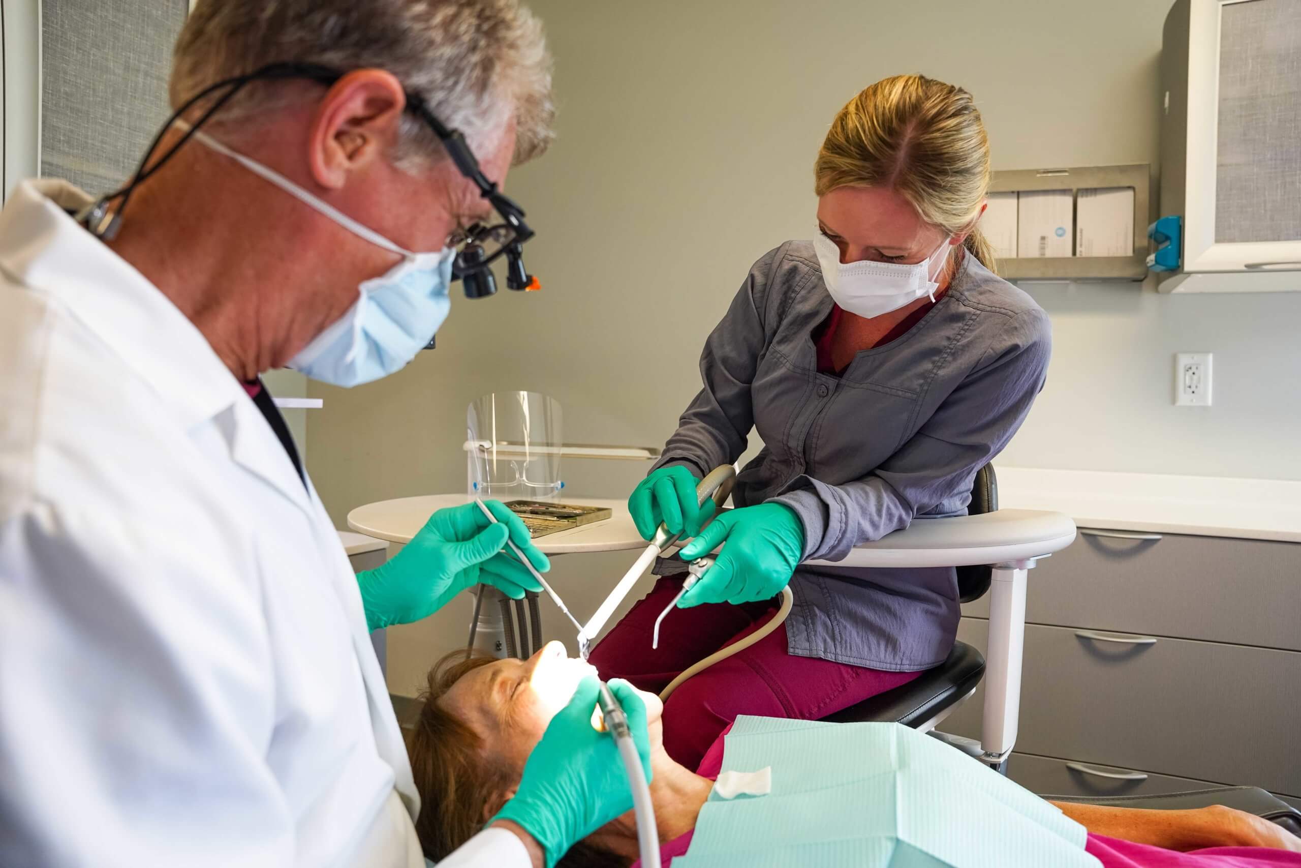 Dentists working on patient